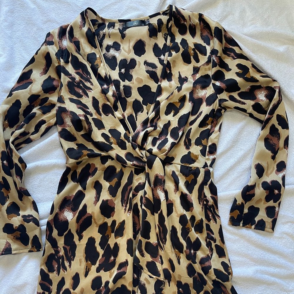 Wildly Sophisticated: Make a Statement with the Leopard Satin Wrapped Dress